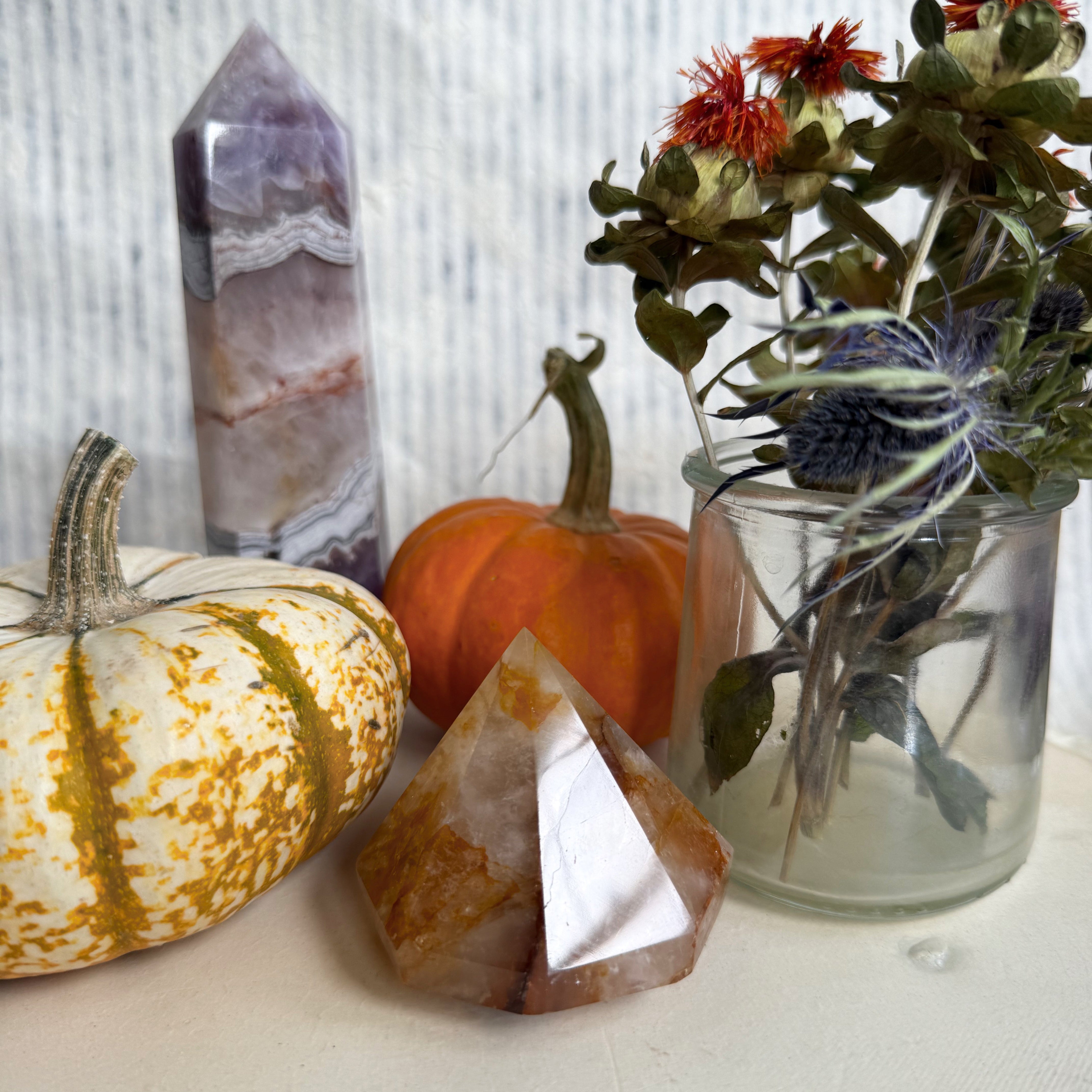 Large golden healer diamond crystal—gold-hued quartz gemstone reflecting natural light, used for energy healing and grounding rituals.