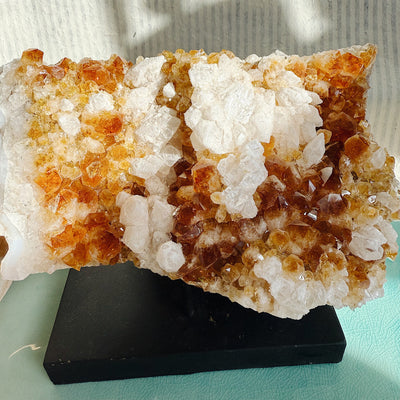 Golden raw Citrine Cluster crystal with sparkling points, displayed for home decor, energy healing, or manifestation practices.